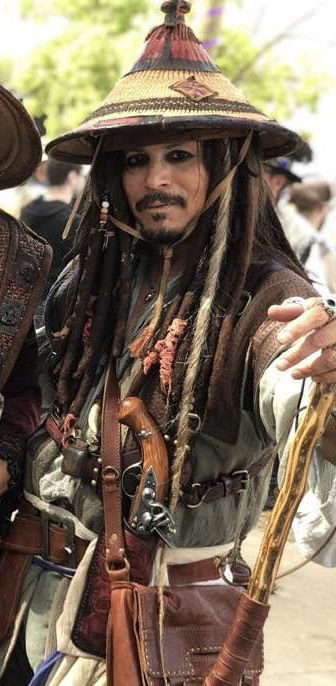 A person wearing a costume from Pirates of the Caribbean